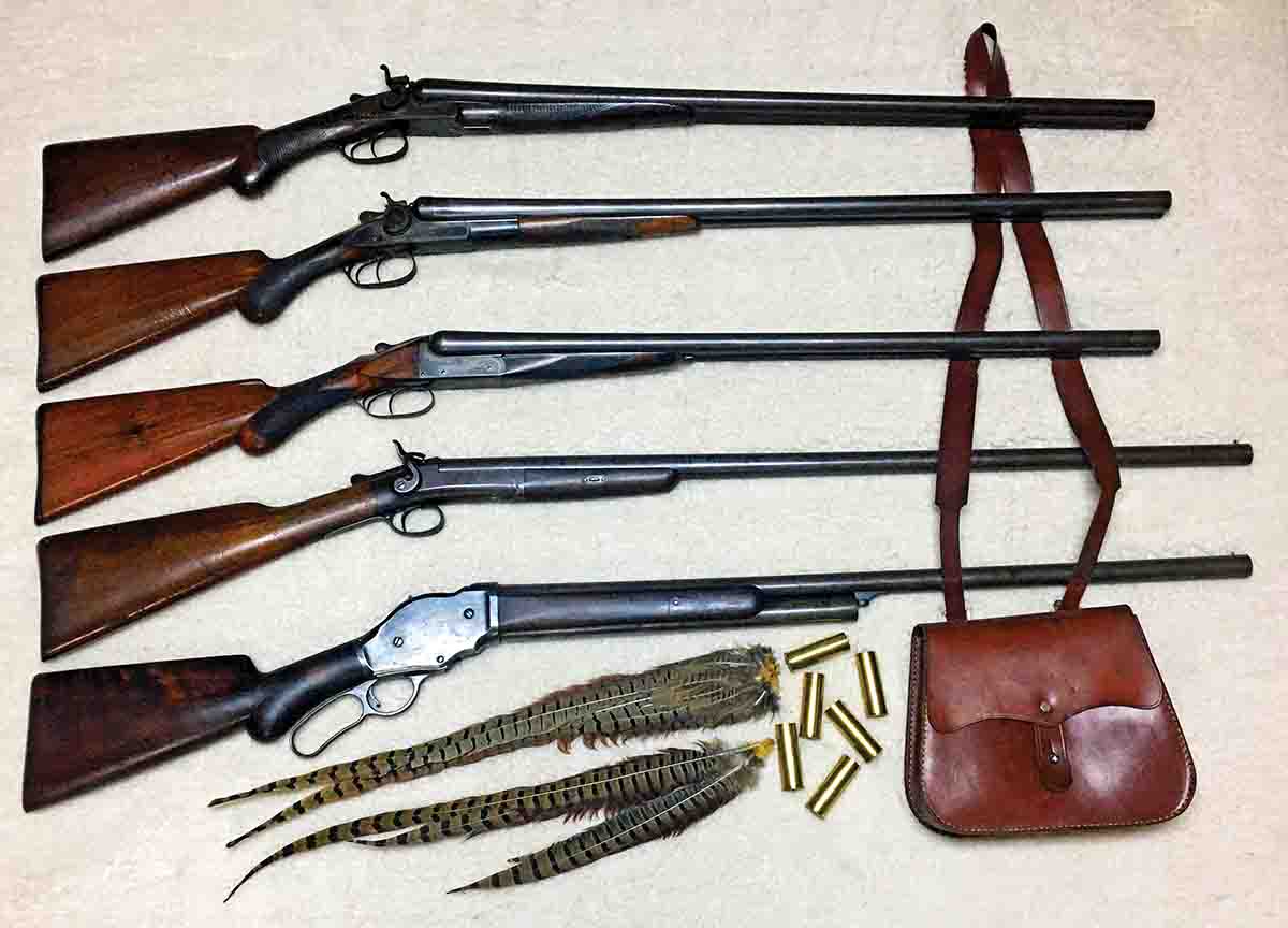 From top: heavy Colt Model 1878 hammer double, shipped in 1879; Remington Model 1889 hammer double; Remington Model 1894 hammerless 28-inch double; Forehand and Wadsworth side-hammer single barrel; Winchester Model 1887 lever action shotgun made in 1888.